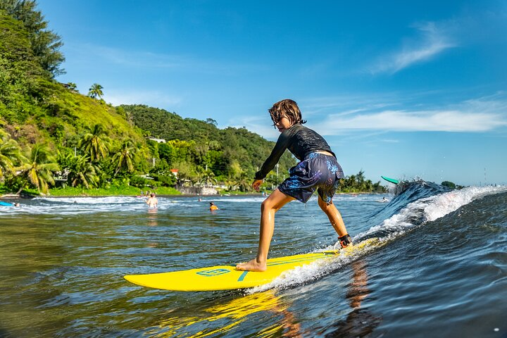 Group Guided Surfing Lesson in Tahiti - Photo 1 of 4